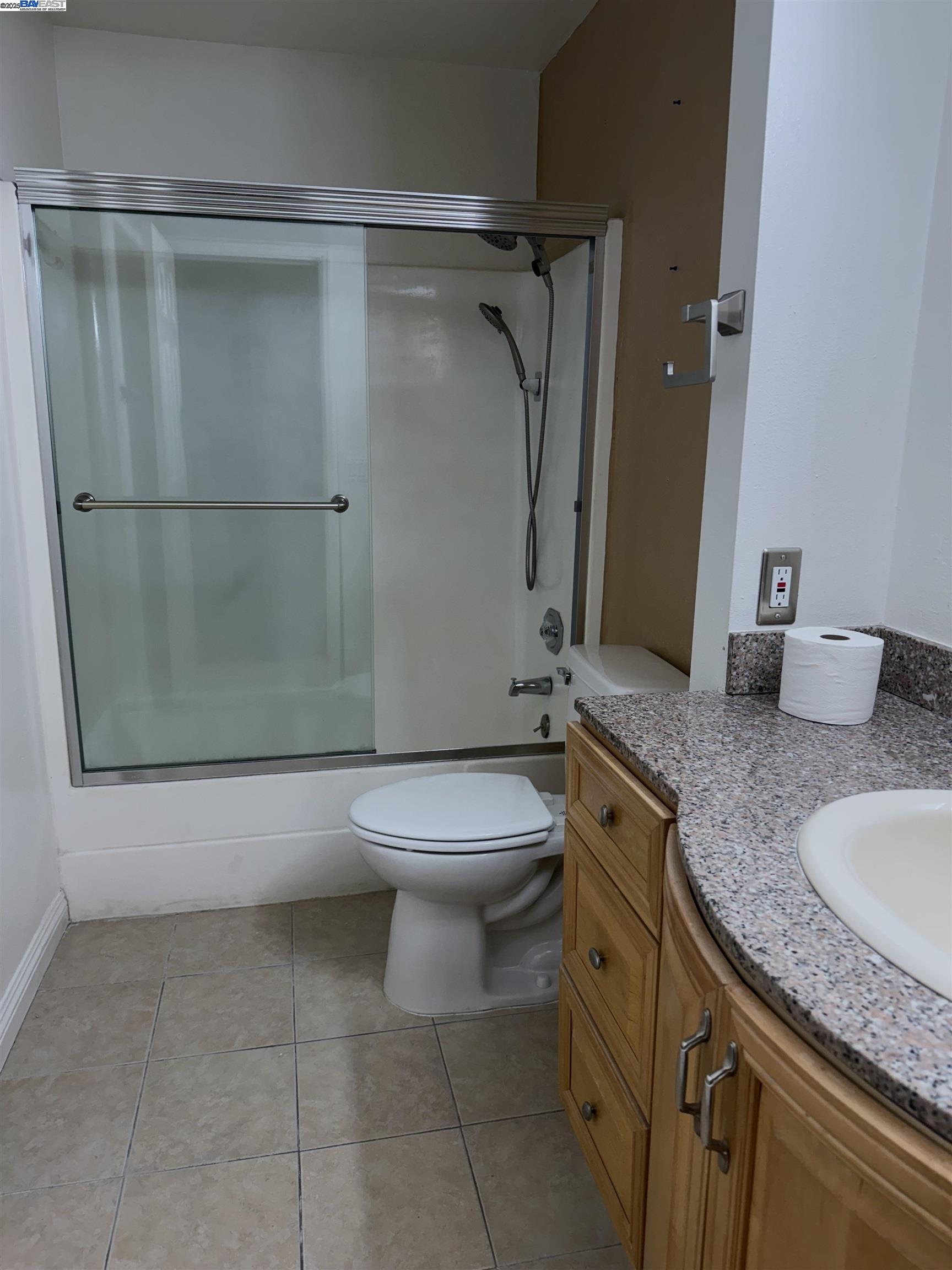 175 East Warren Common Fremont, CA 94539 - Photo 6 of 16 a bathroom with a granite countertop sink toilet and shower
