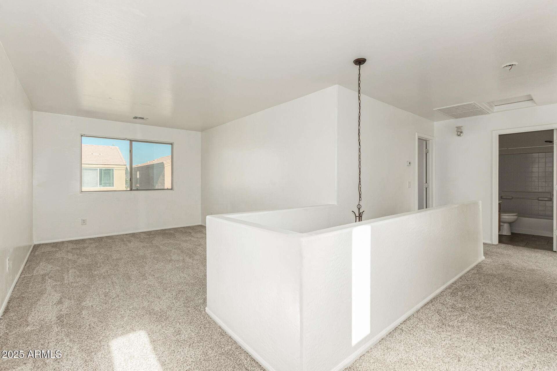 7596 West Charter Oak Road Peoria, AZ 85381 - Photo 12 of 29 a view of a kitchen with white cabinets