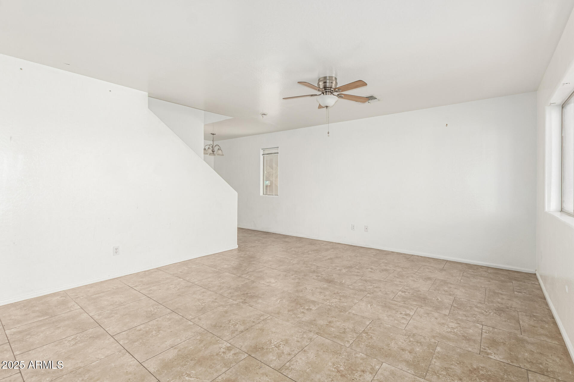 7596 West Charter Oak Road Peoria, AZ 85381 - Photo 5 of 29 a view of a big room with carpet