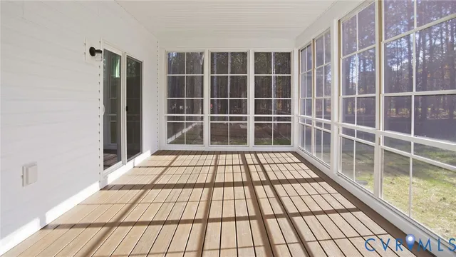 a view of empty room with windows