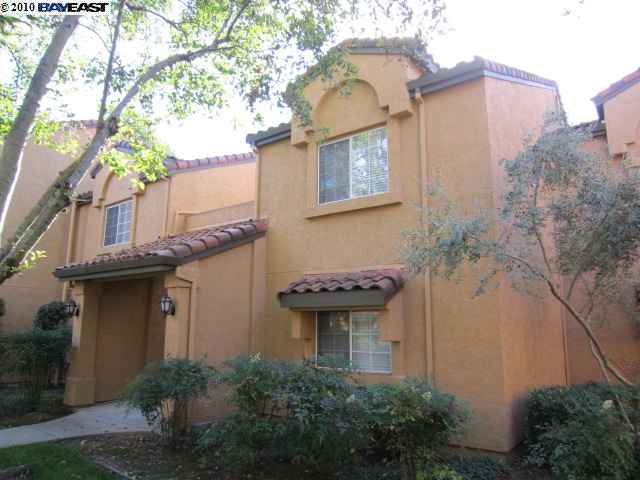 755 Watson Canyon Court, Unit 233 San Ramon, CA 94582 - Photo 1 of 1 a view of a house with a fountain