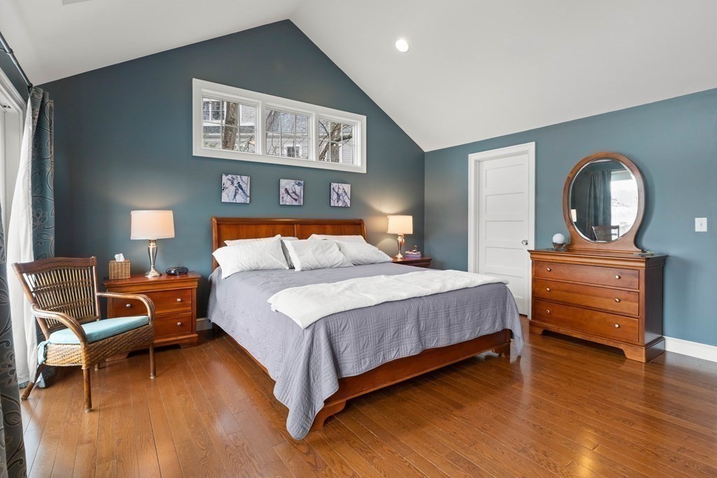 4 Birchmeadow Road Amesbury, MA 01913 - Photo 22 of 42 a bedroom with a bed and a chair