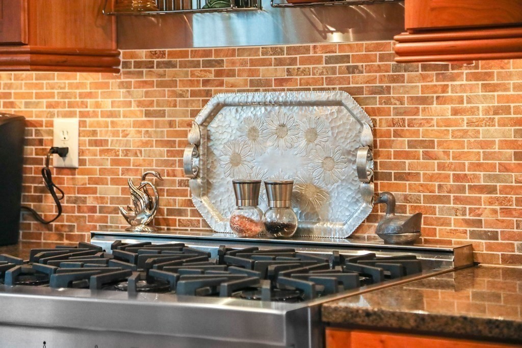 4 Birchmeadow Road Amesbury, MA 01913 - Photo 8 of 42 a kitchen with a stove and a sink