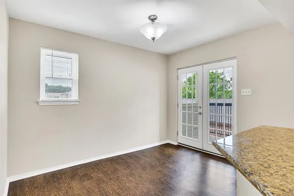 a kitchen with a stove and a microwave