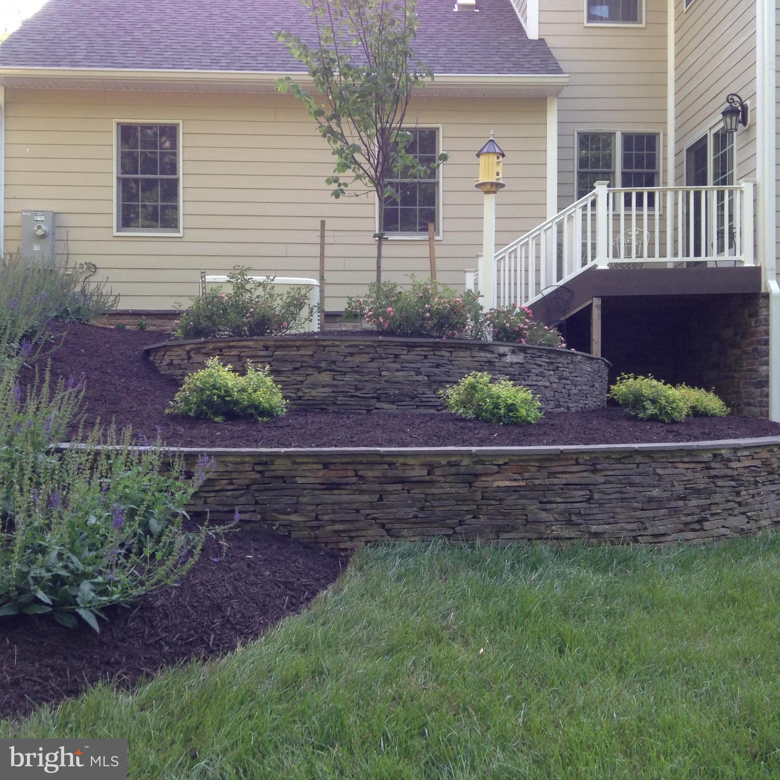 8485 Rogues Road Warrenton, VA 20187 - Photo 65 of 121 a front view of a house with a yard