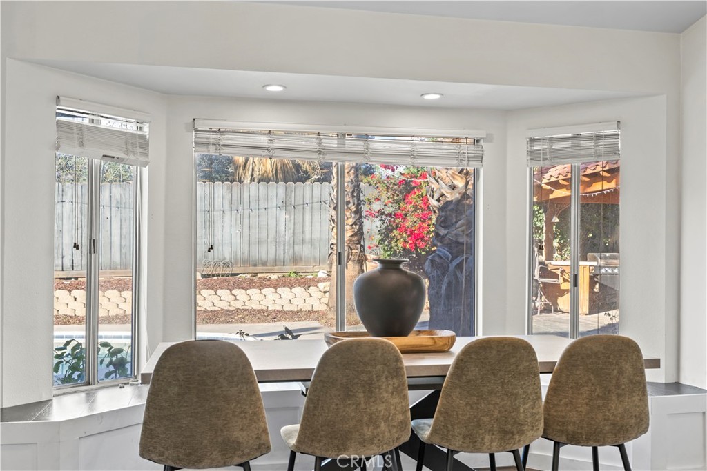 28046 Millar Street Highland, CA 92346 - Photo 18 of 39 a living room with furniture and a potted plant