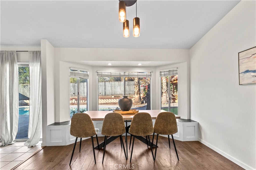 28046 Millar Street Highland, CA 92346 - Photo 19 of 39 a living room with furniture and wooden floor