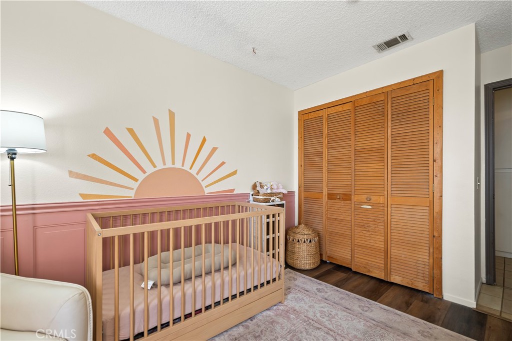 28046 Millar Street Highland, CA 92346 - Photo 21 of 39 a view of livingroom with furniture and windows