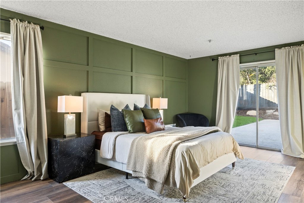 28046 Millar Street Highland, CA 92346 - Photo 28 of 39 a bedroom with bed and a window