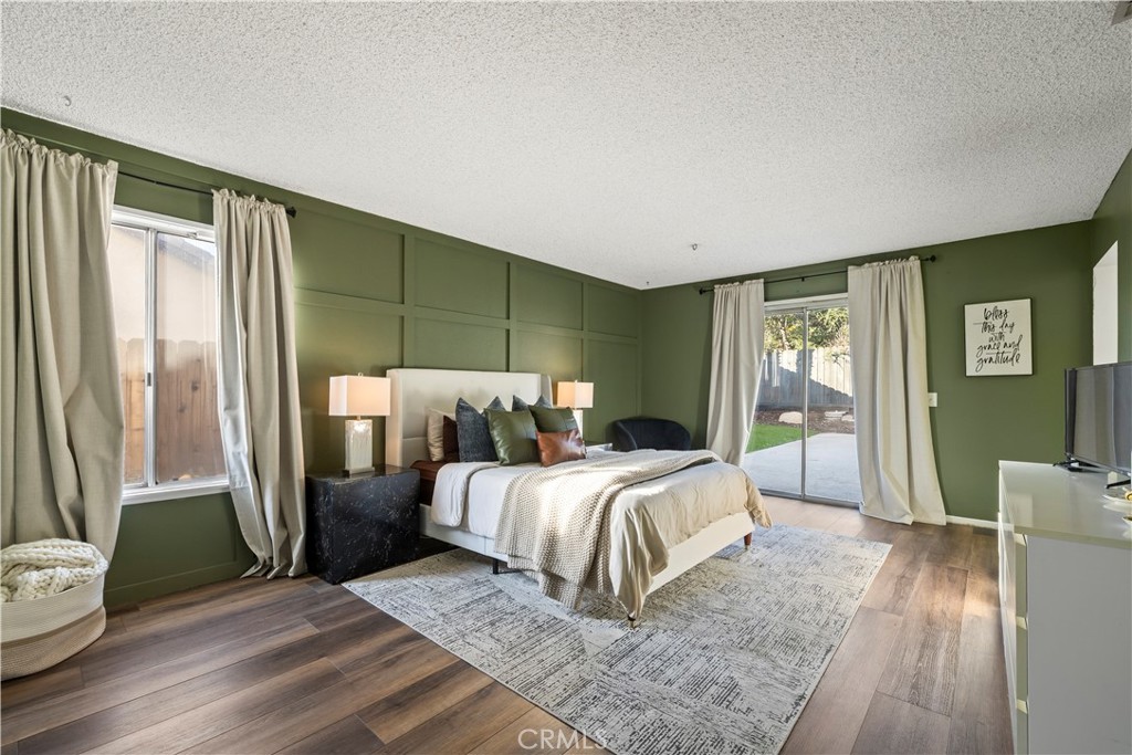 28046 Millar Street Highland, CA 92346 - Photo 29 of 39 a bedroom with a bed and large window