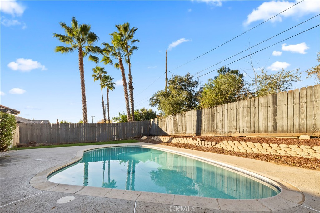 28046 Millar Street Highland, CA 92346 - Photo 33 of 39 a view of a swimming pool with a lounge chair