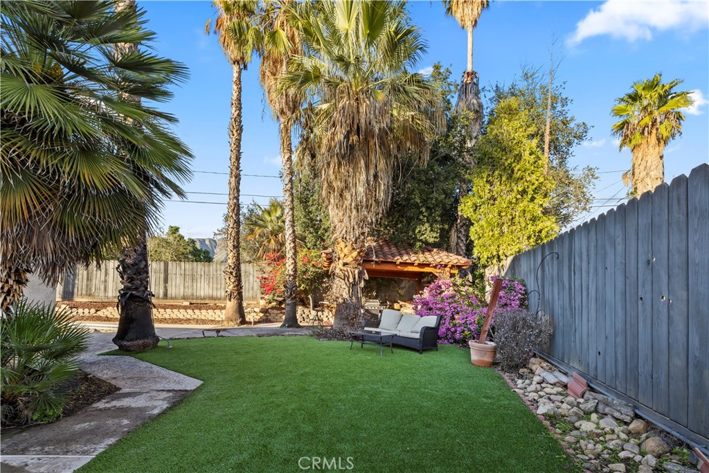 28046 Millar Street Highland, CA 92346 - Photo 38 of 39 a garden with palm trees