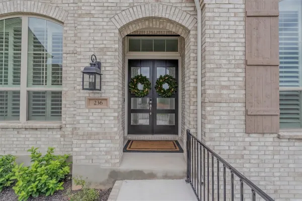 a kitchen with lots of counter space and painting on the wall