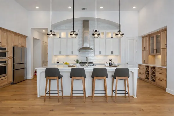 an aerial view of a house with lake view