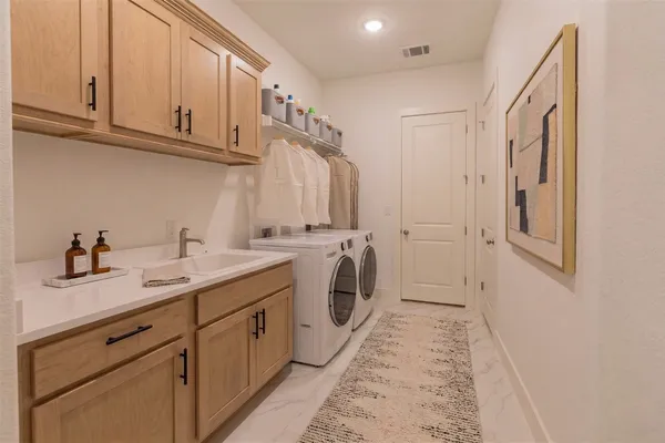 a view of a livingroom with furniture and a window