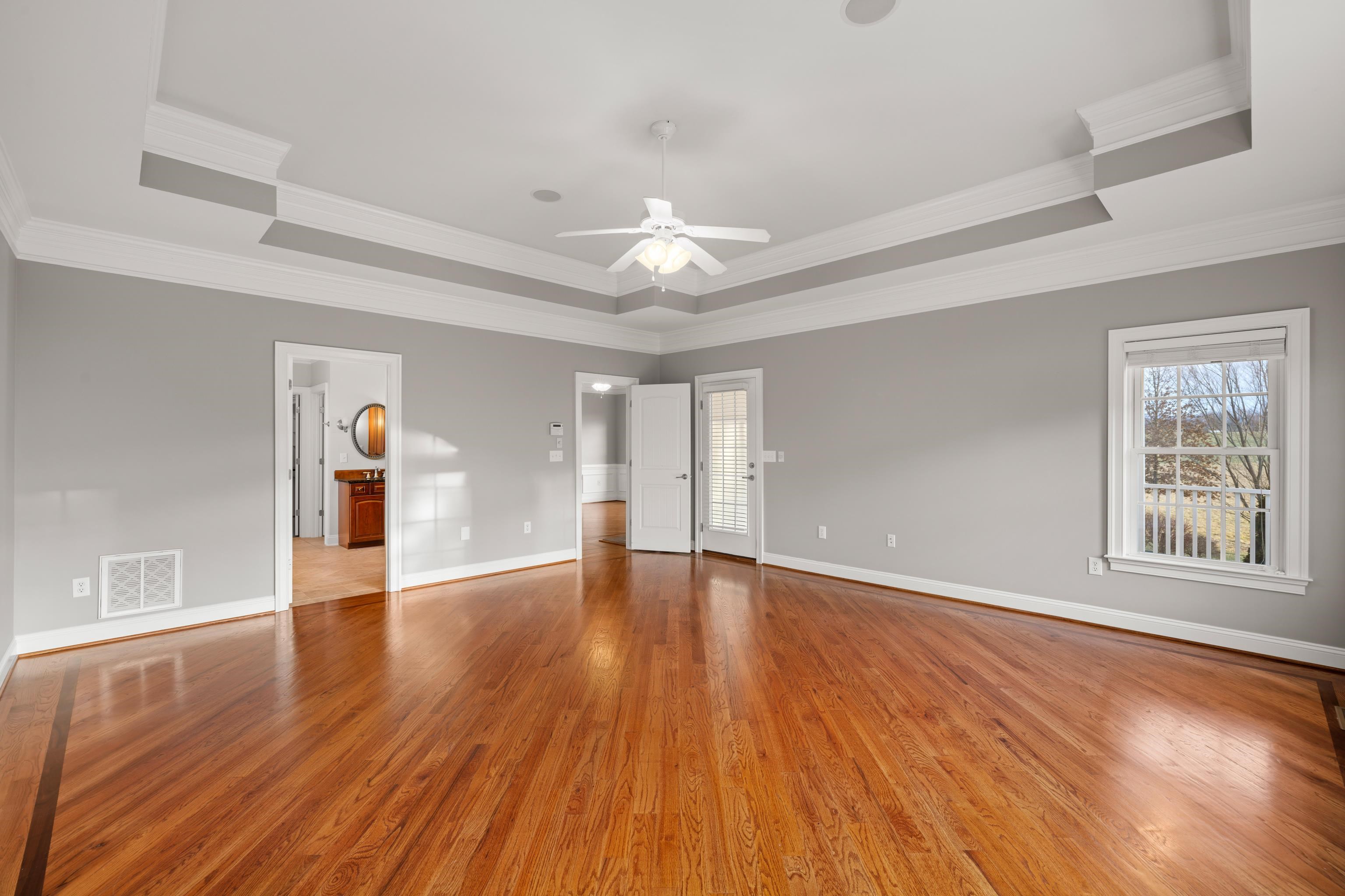 3485 Barterbrook Road Staunton, VA 24401 - Photo 26 of 71 a view of an empty room with window and wooden floor