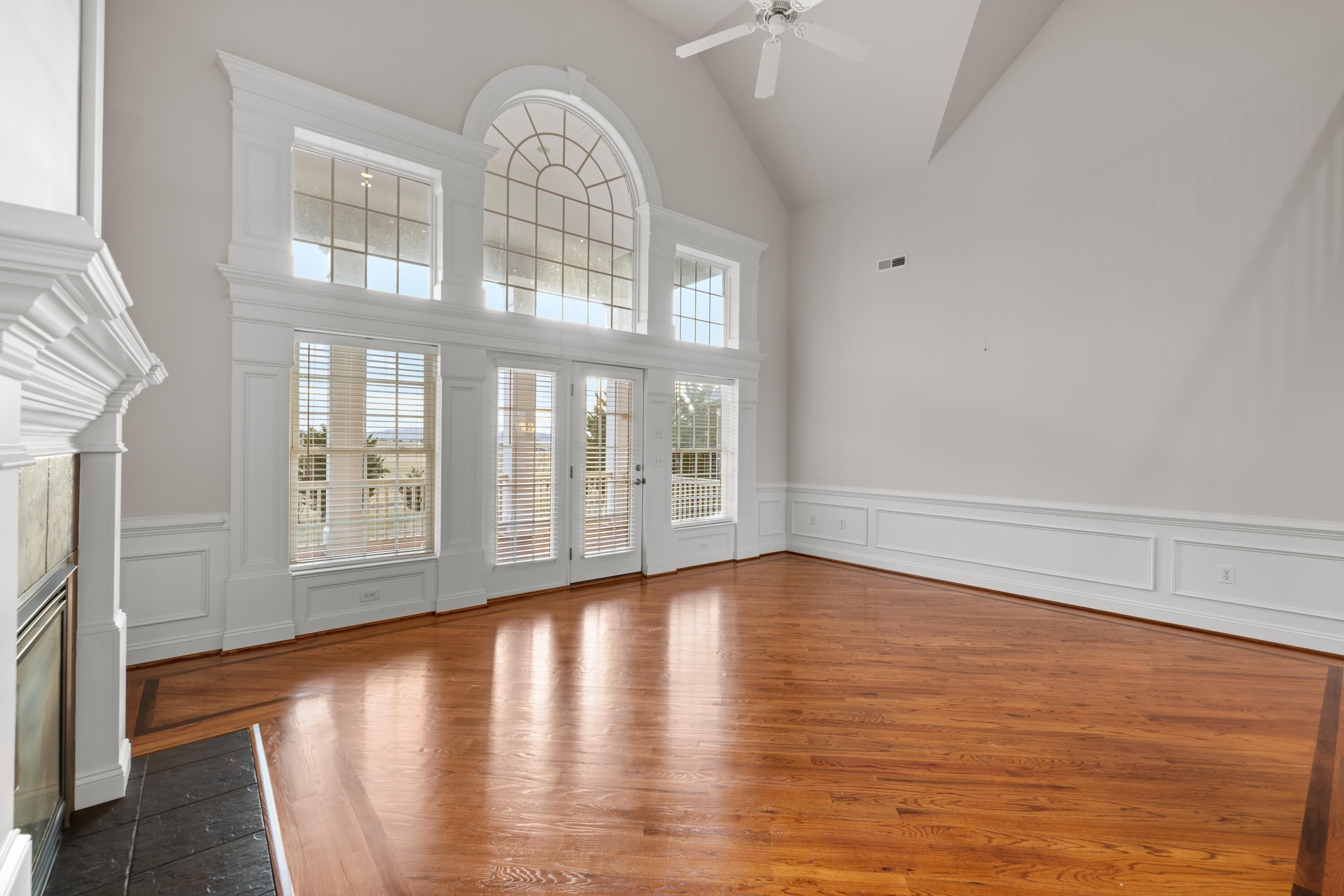 3485 Barterbrook Road Staunton, VA 24401 - Photo 7 of 71 a view of an empty room with wooden floor and a window