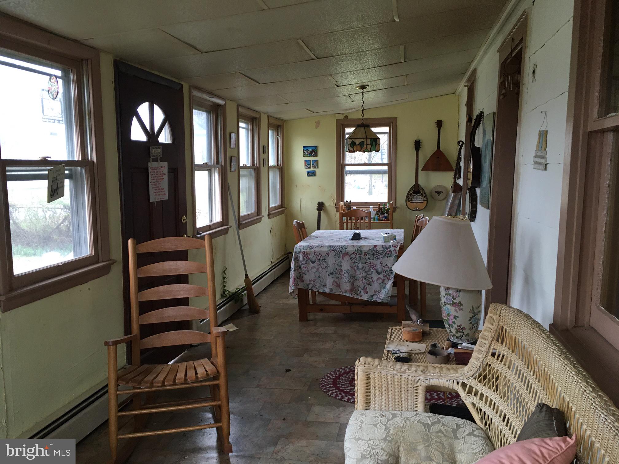 5876 Coleman Road Rock Hall, MD 21661 - Photo 4 of 13 Enclosed front porch or sitting room