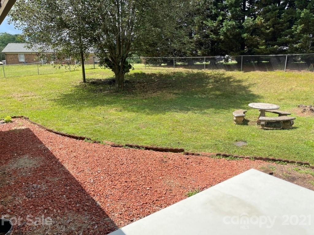 129 Loray Farm Road Dallas, NC 28034 - Photo 8 of 28 a view of a lake with a yard