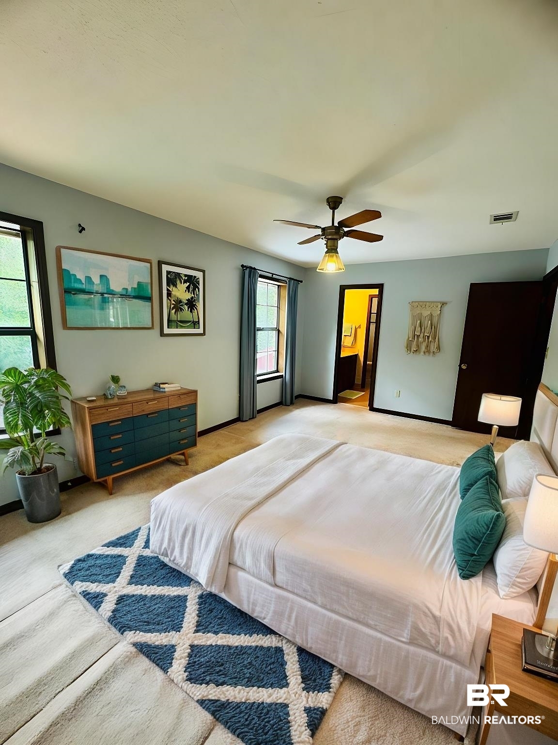 2240 Perdido Circle Lillian, AL 36549 - Photo 10 of 42 Carpeted bedroom featuring multiple windows and ceiling fan