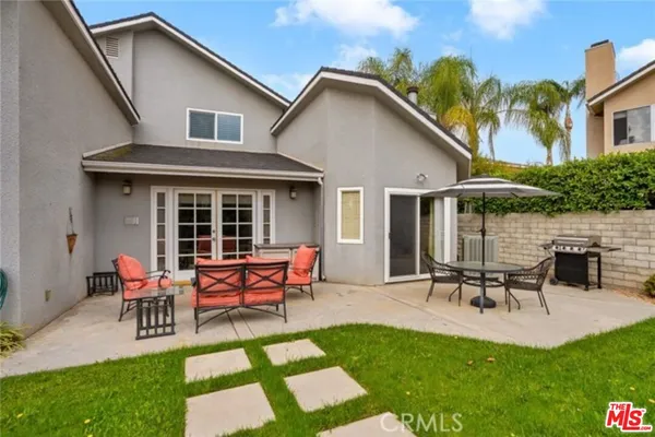 a view of a house with patio