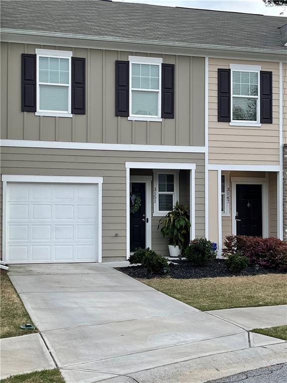 3151 Tarian Way Decatur, GA 30034 - Photo 1 of 1 a front view of a house with garden