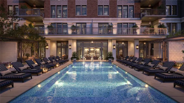 a building outdoor space with patio furniture and potted plants