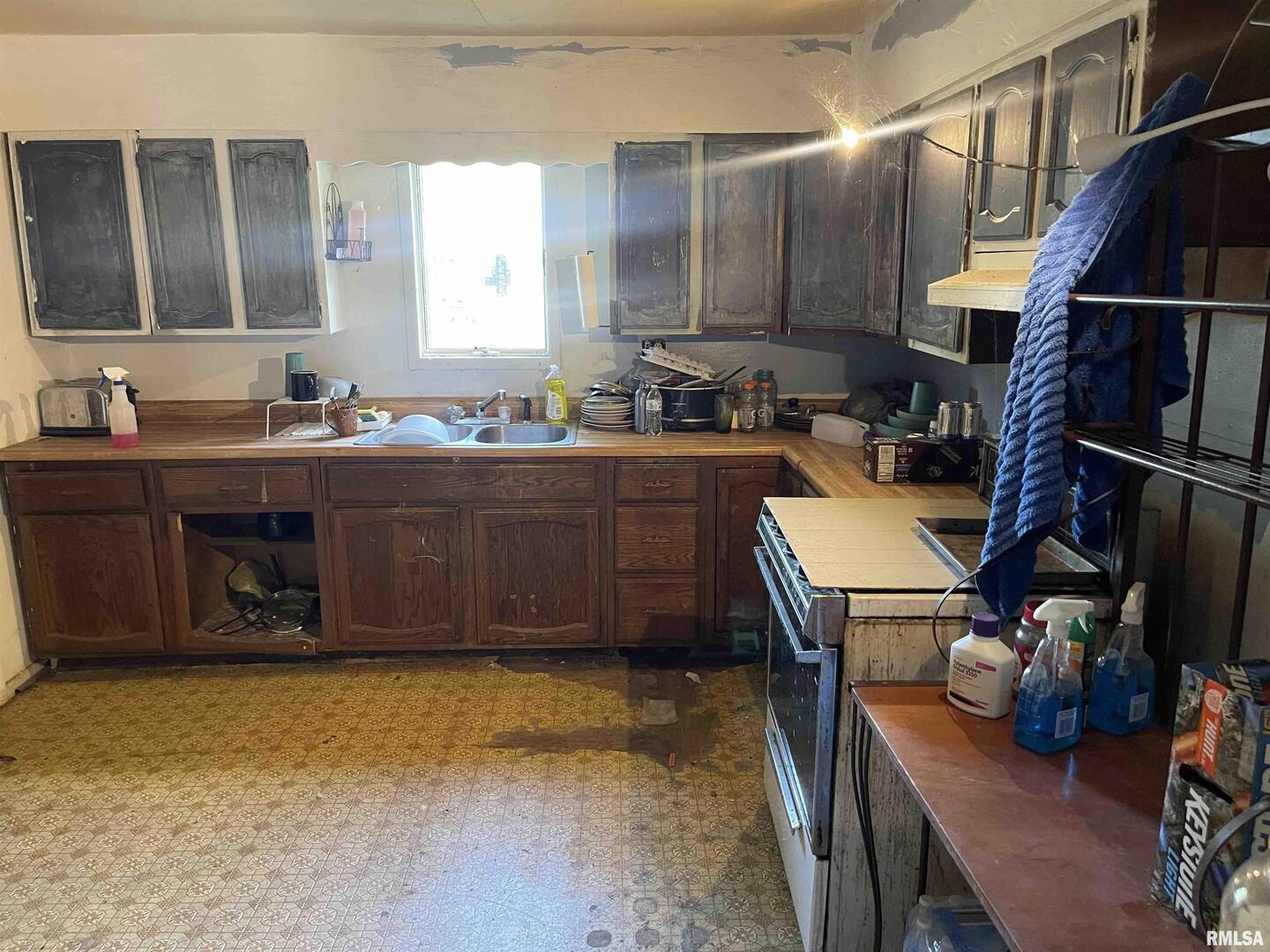 502 East Matthew Street Sesser, IL 62884 - Photo 18 of 18 a view of kitchen sink and wooden cabinets