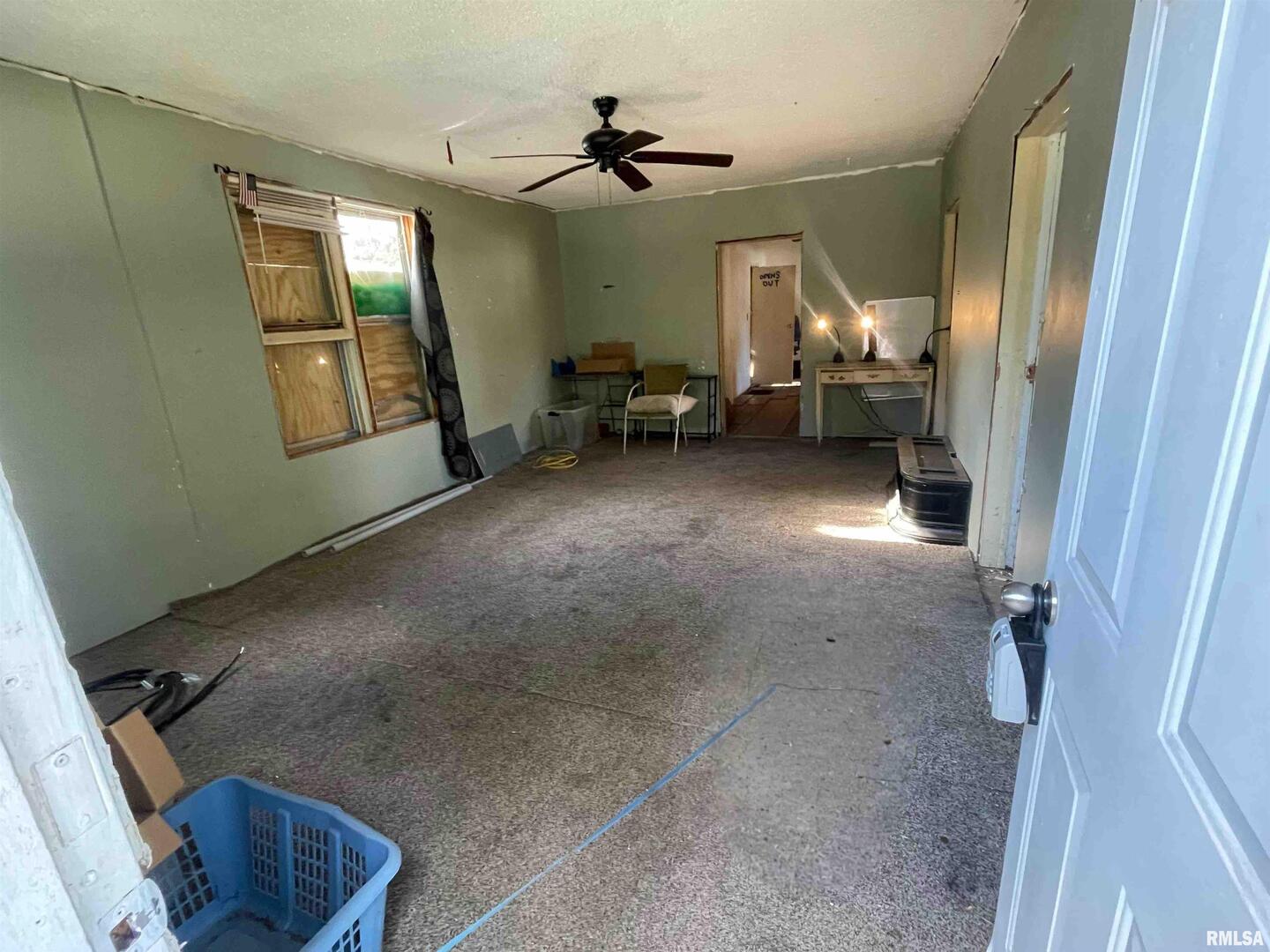 502 East Matthew Street Sesser, IL 62884 - Photo 6 of 18 a view of a livingroom with furniture and windows