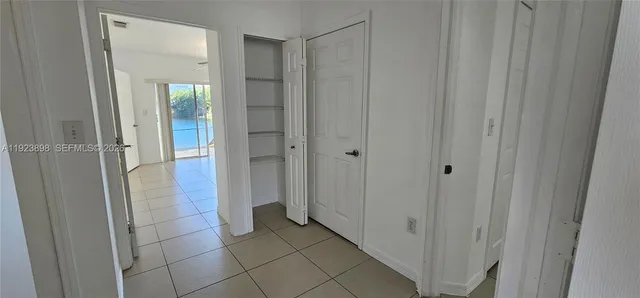 a bathroom with a toilet a sink and shower