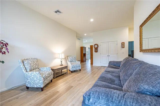 a living room with furniture and a couch