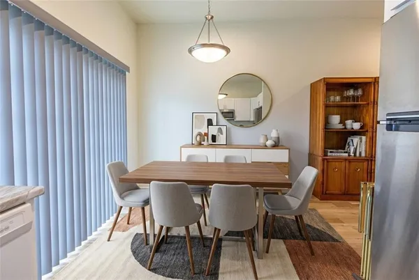 a view of a dining room with furniture