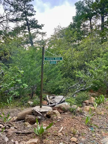 a view of a balcony with wooden floor