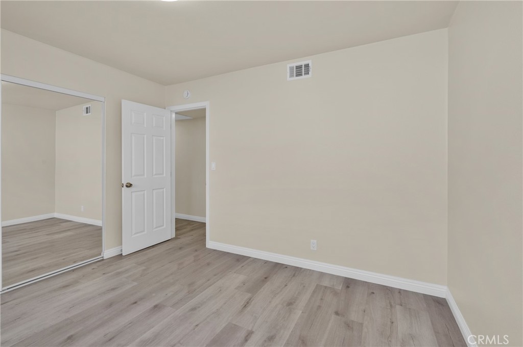 20537 East Vejar Road Walnut, CA 91789 - Photo 20 of 34 an empty room with wooden floor