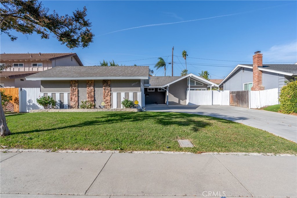 20537 East Vejar Road Walnut, CA 91789 - Photo 2 of 34 a front view of a house with a garden
