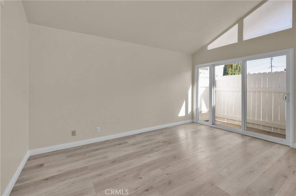 20537 East Vejar Road Walnut, CA 91789 - Photo 23 of 34 an empty room with wooden floor and windows