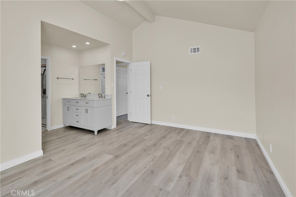 20537 East Vejar Road Walnut, CA 91789 - Photo 25 of 34 an empty room with wooden floor and windows