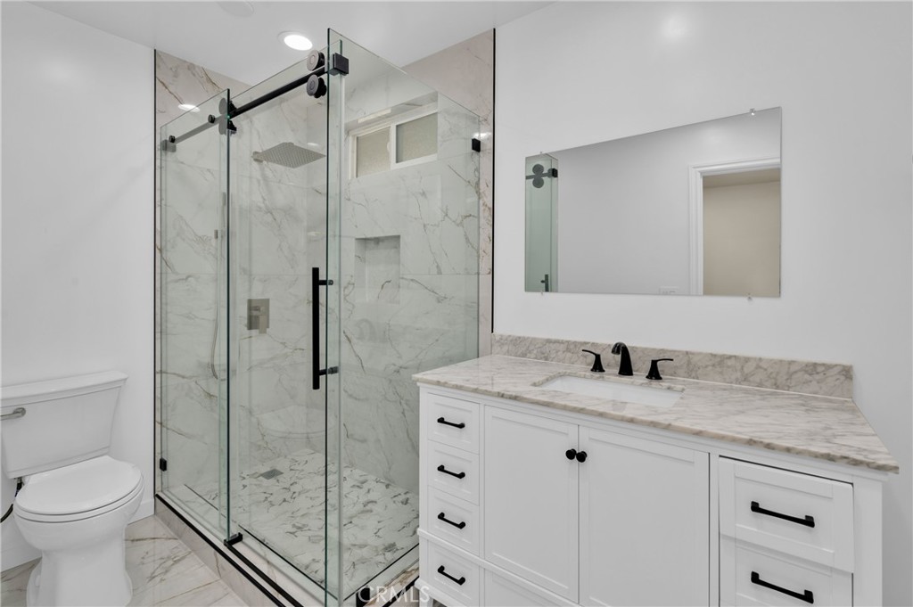 20537 East Vejar Road Walnut, CA 91789 - Photo 7 of 34 a bathroom with a shower sink vanity mirror and toilet