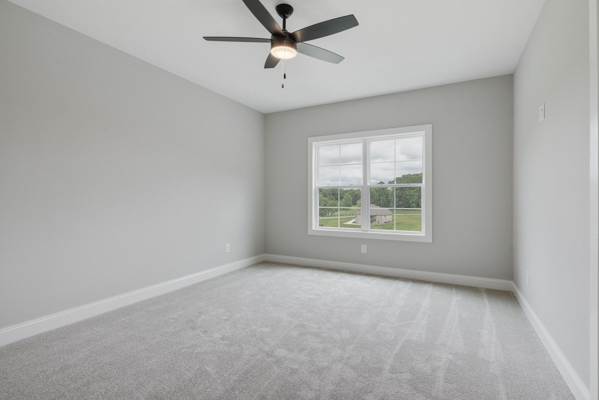 5459 Manners Road Lebanon, TN 37087 - Photo 36 of 45 an empty room with a window and a fan
