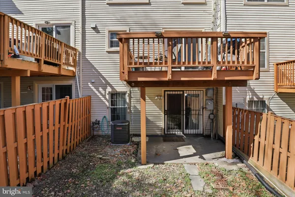 a view of a house with wooden stairs