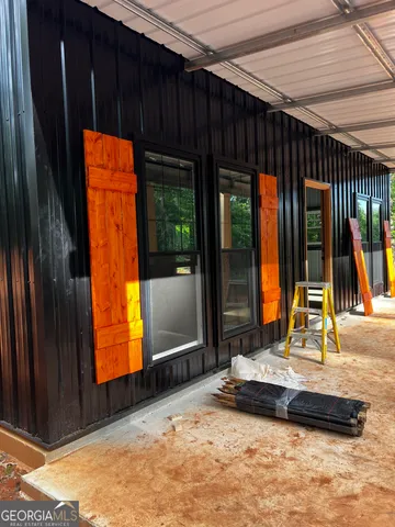 a view of backyard from a room