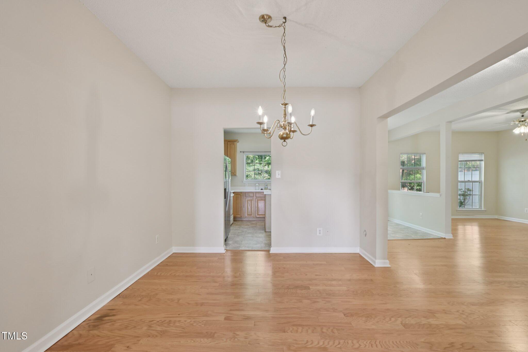 1031 Lake Moraine Place Raleigh, NC 27607 - Photo 7 of 33 a view of an empty room and window