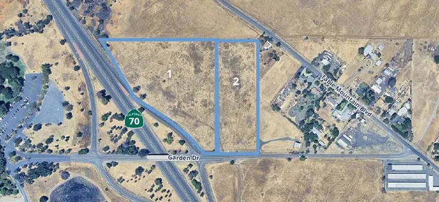 a view of residential house with trees all around