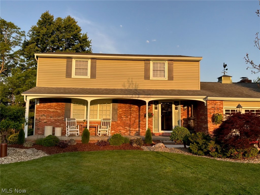 8420 West Ridge Road Elyria, OH 44035 - Photo 2 of 32 landscaped and view of front porch
