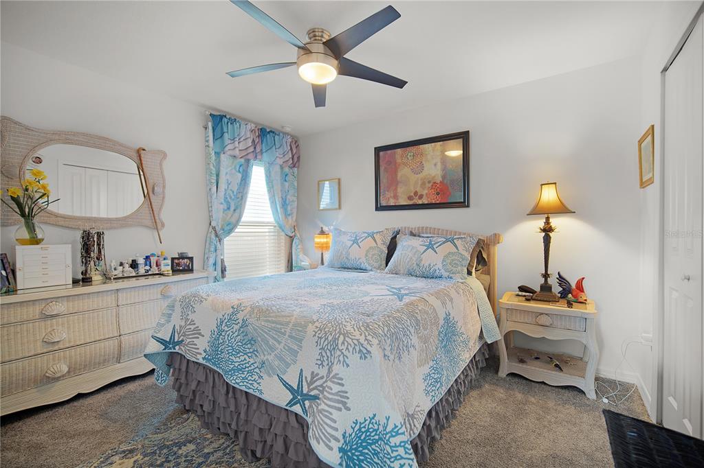 287 Inman Boulevard Winter Haven, FL 33881 - Photo 13 of 19 a bedroom with bed and window