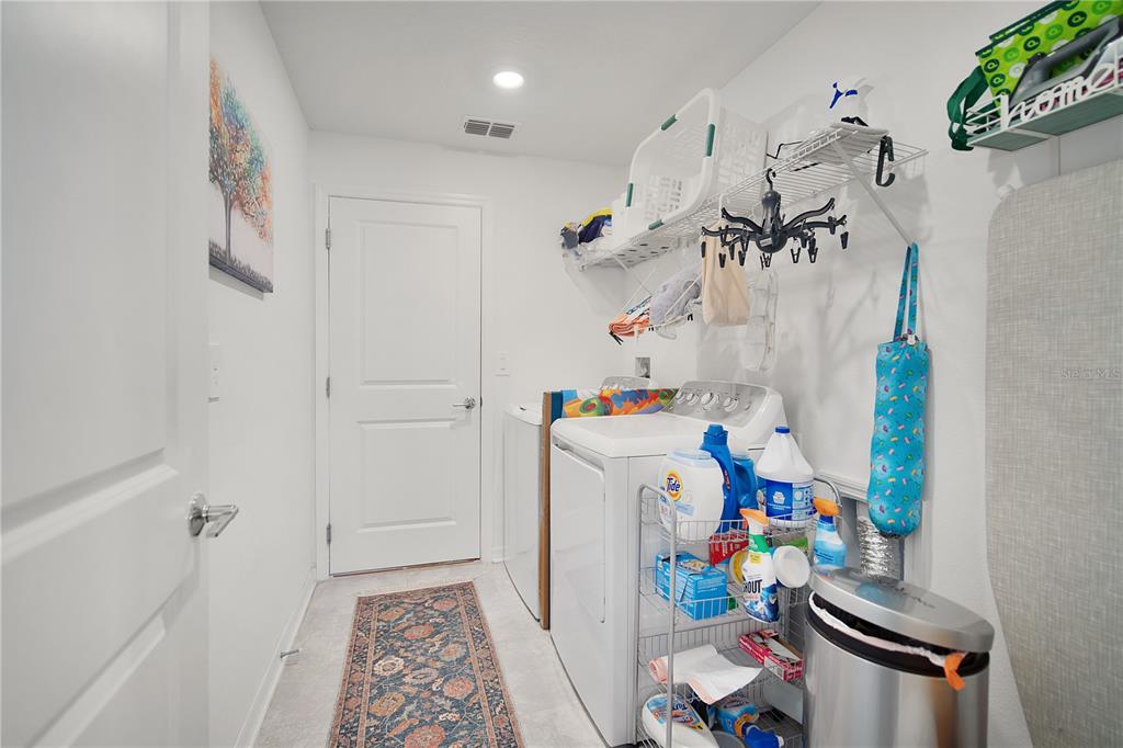 287 Inman Boulevard Winter Haven, FL 33881 - Photo 18 of 19 a room with storage and utility