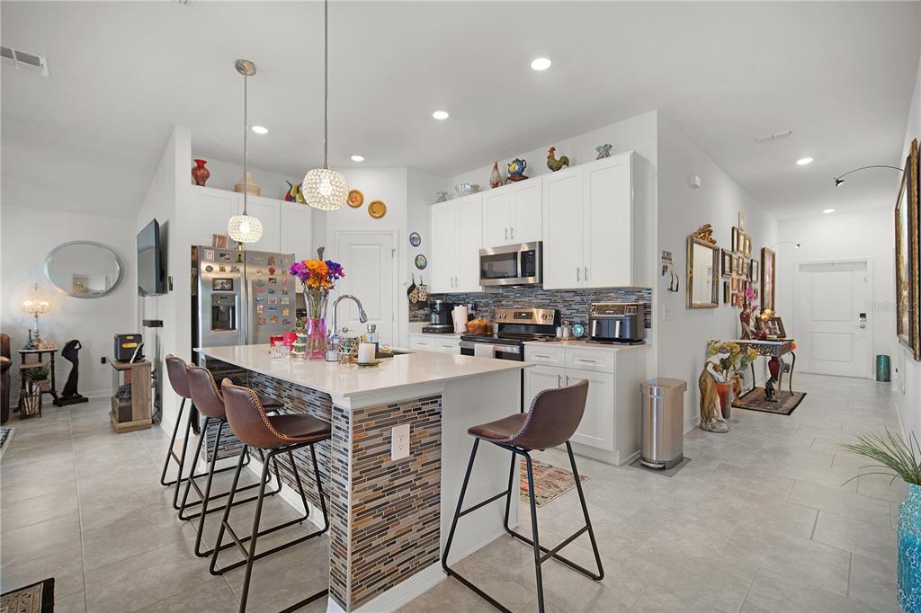 287 Inman Boulevard Winter Haven, FL 33881 - Photo 6 of 19 a view of kitchen and windows