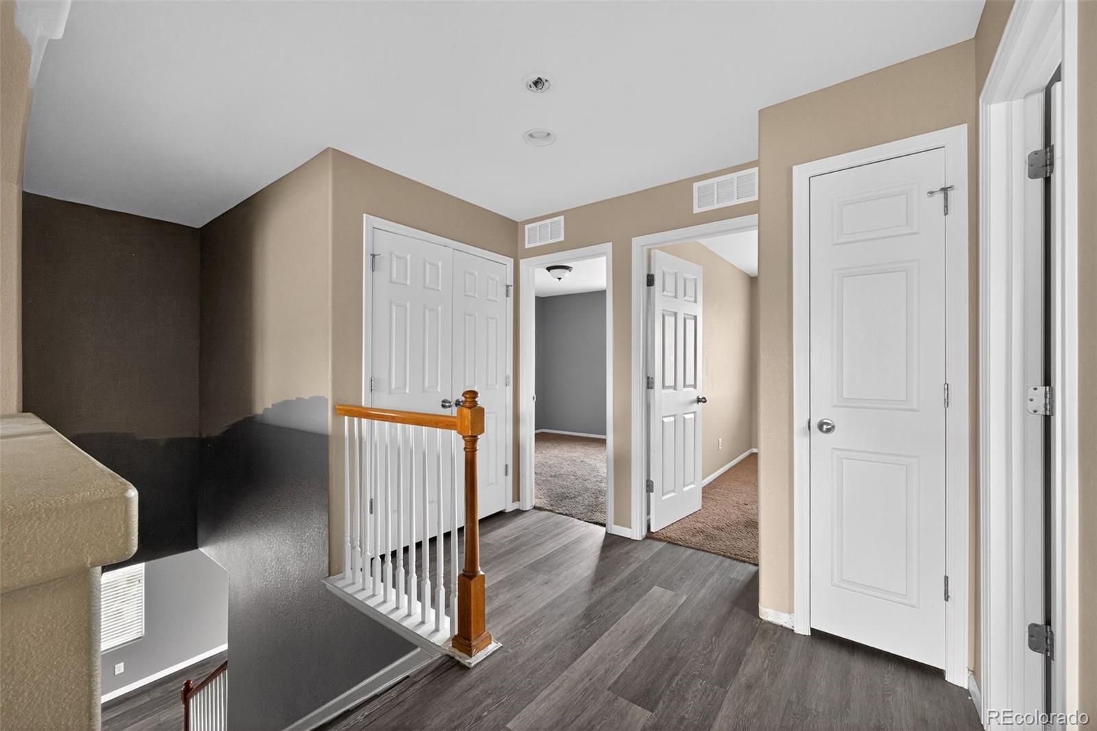5085 Ridgewood Drive Johnstown, CO 80534 - Photo 27 of 30 a view of an empty room with wooden floor and a window