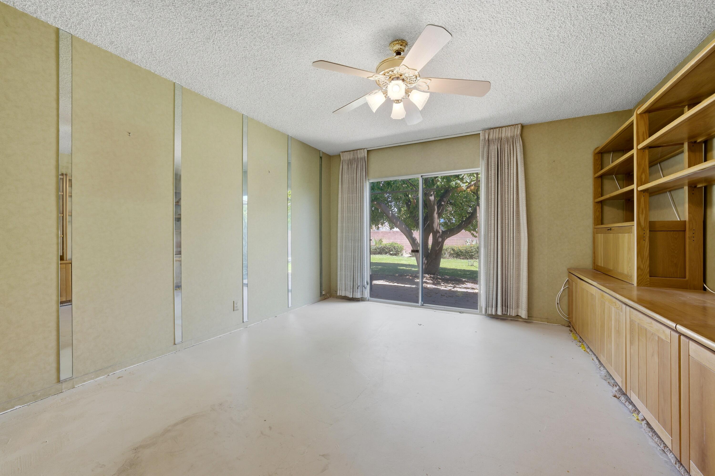 36990 Ferber Drive Rancho Mirage, CA 92270 - Photo 16 of 29 a view of a room with wooden floor fan and windows