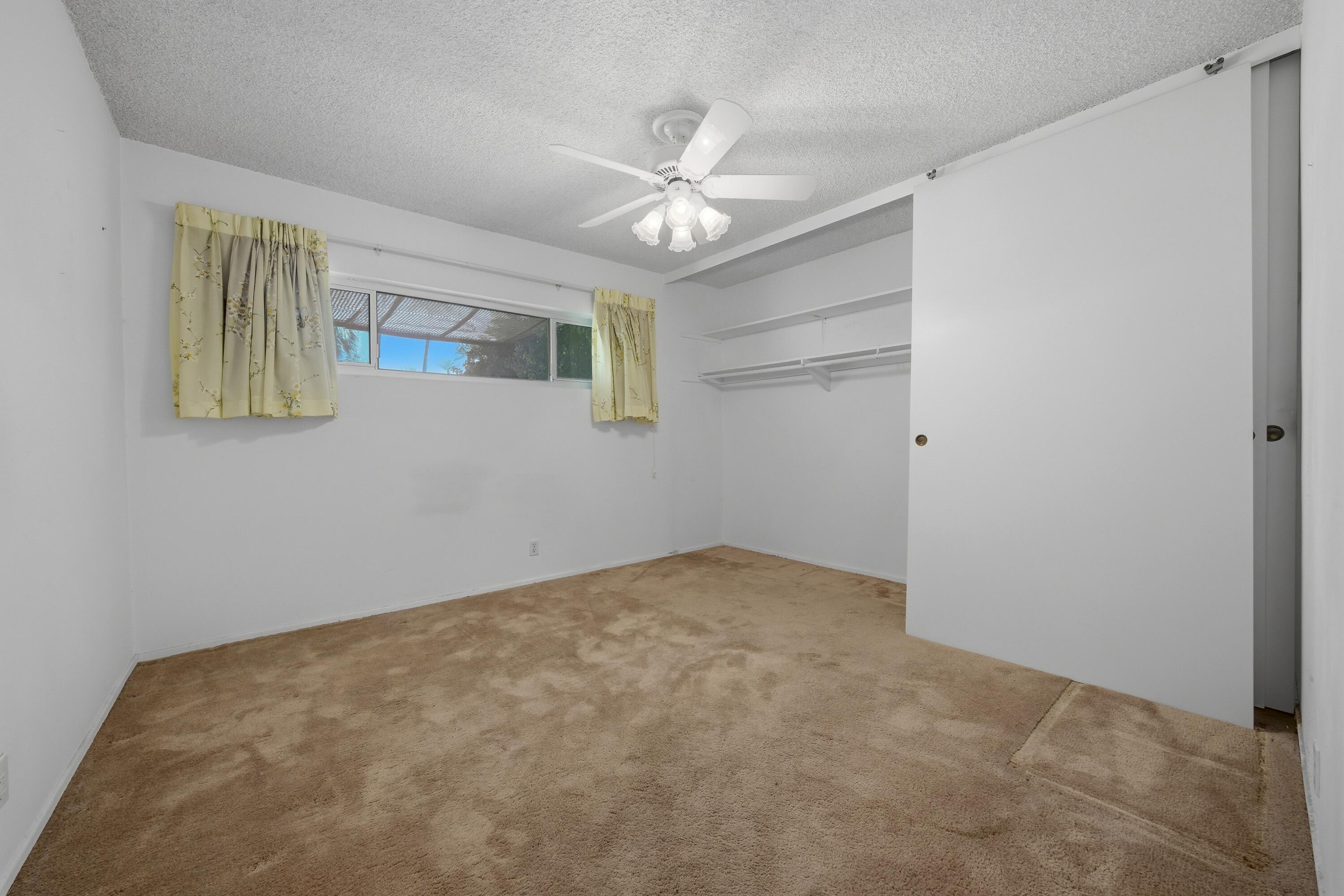 36990 Ferber Drive Rancho Mirage, CA 92270 - Photo 18 of 29 a view of an empty room with a window